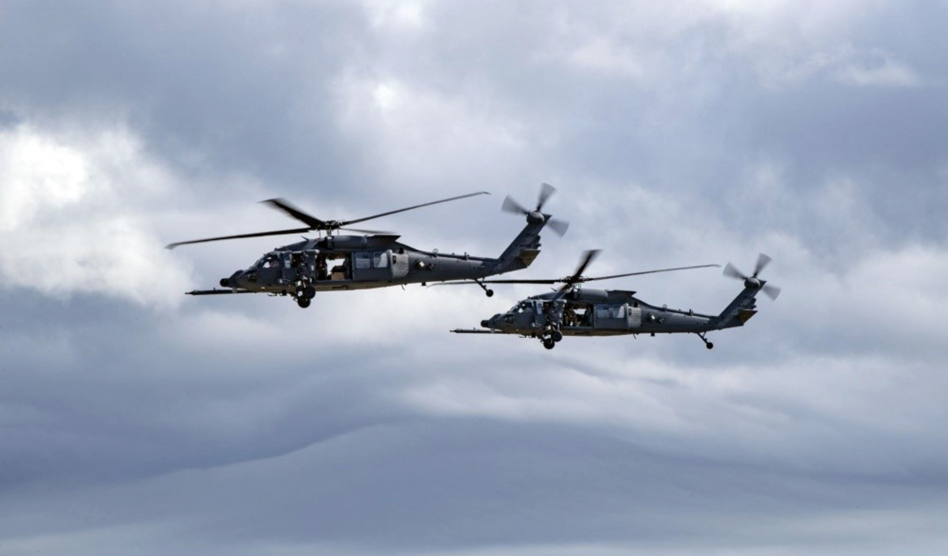 The Air Force’s first pair of Jolly Green IIs prepare to land at Moody Air Force Base in Georgia; U.S. Air Force photo by Andrea Jenkins